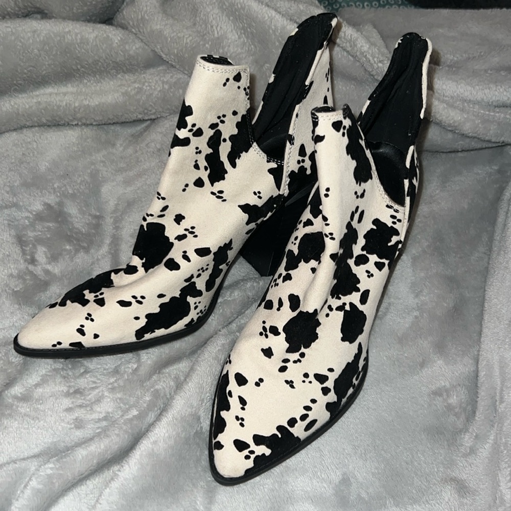 Size 7.5 suede cow print booties. Brand new, never warn.